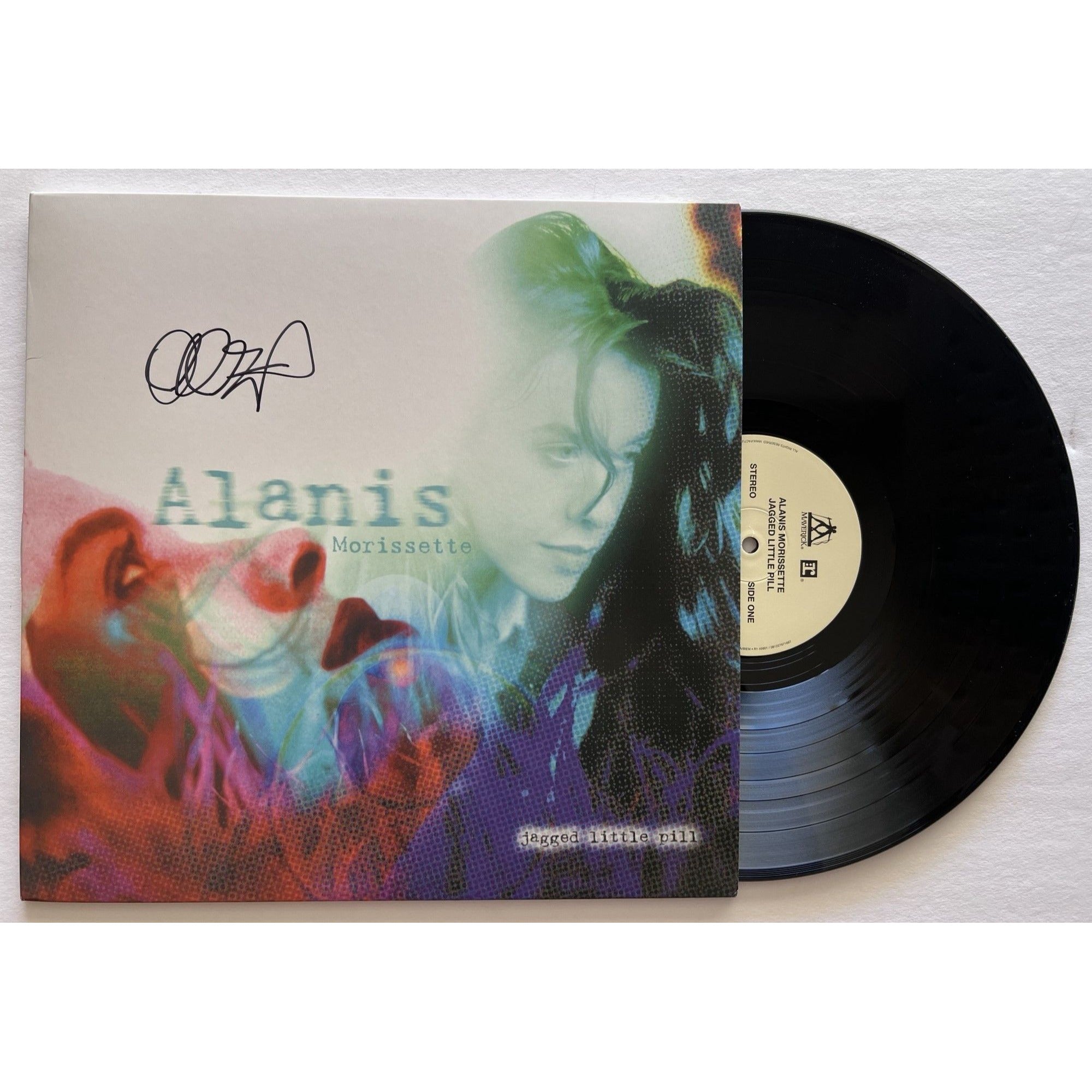 Alanis Morissette 'Jagged Little Pill' original LP signed with proof