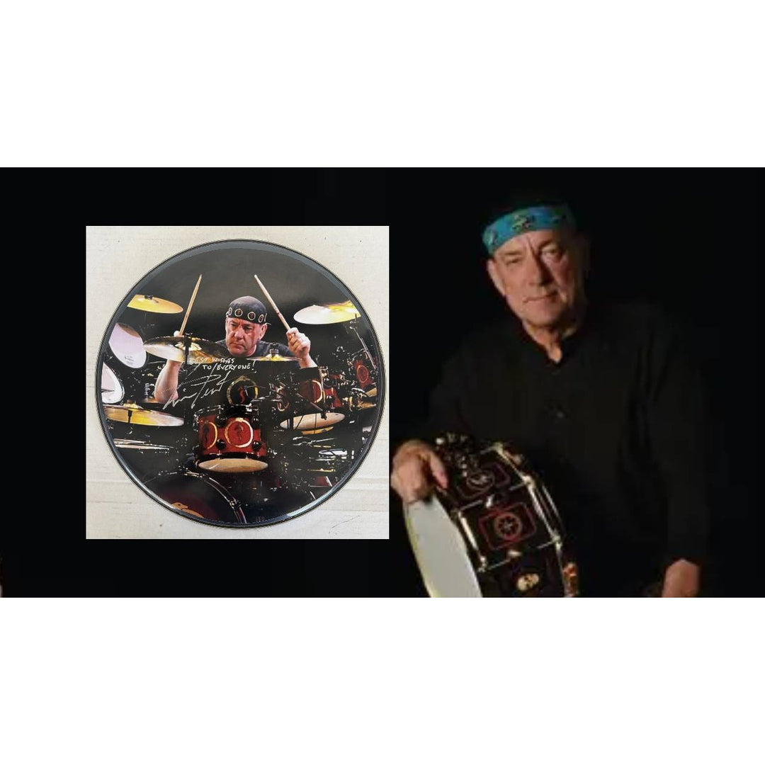 Neil Peart Rushs' iconic drummer drumhead signed with proof.