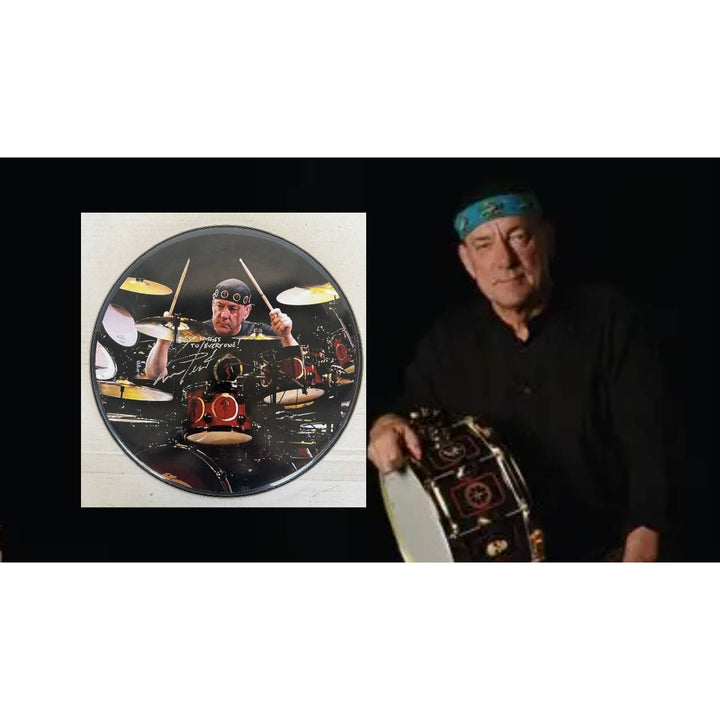 Neil Peart Rushs' iconic drummer drumhead signed with proof.