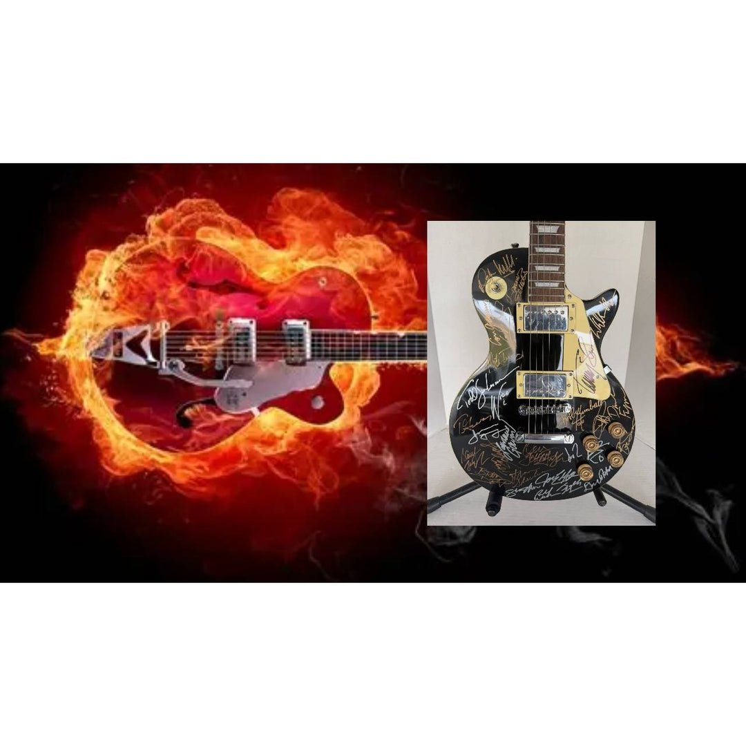 Foreigner Boston, Toto, Steely Dan, Kansas, Styx, Boz Scaggs, Steve Miller black Les Paul electric guitar signed with proof.