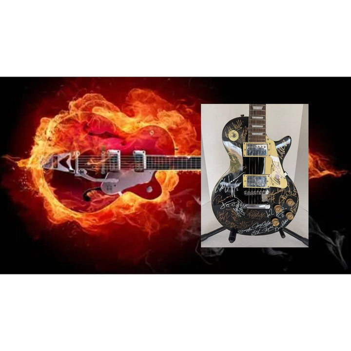 Foreigner Boston, Toto, Steely Dan, Kansas, Styx, Boz Scaggs, Steve Miller black Les Paul electric guitar signed with proof.