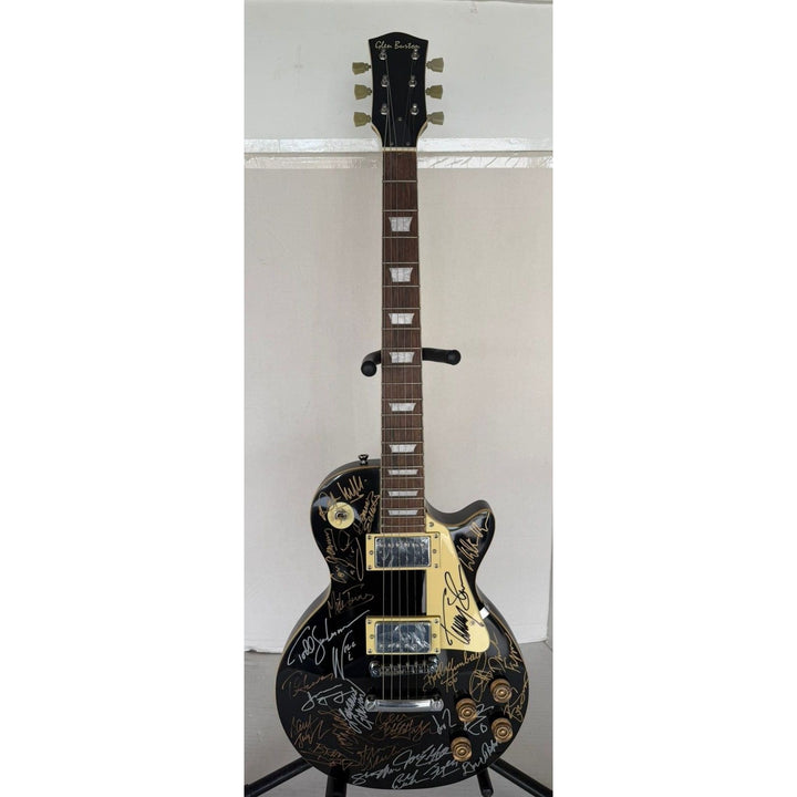 Foreigner Boston, Toto, Steely Dan, Kansas, Styx, Boz Scaggs, Steve Miller black Les Paul electric guitar signed with proof.