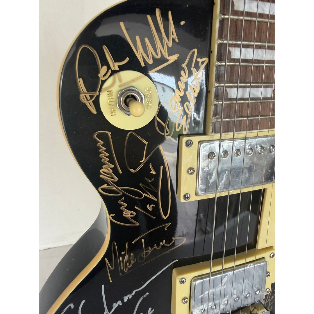 Foreigner Boston, Toto, Steely Dan, Kansas, Styx, Boz Scaggs, Steve Miller black Les Paul electric guitar signed with proof.