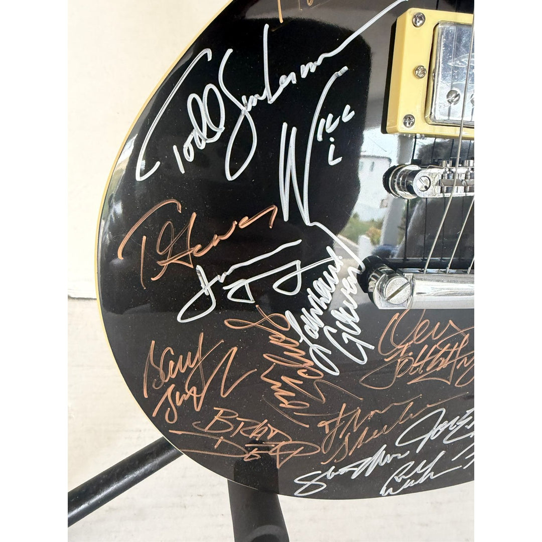 Foreigner Boston, Toto, Steely Dan, Kansas, Styx, Boz Scaggs, Steve Miller black Les Paul electric guitar signed with proof.