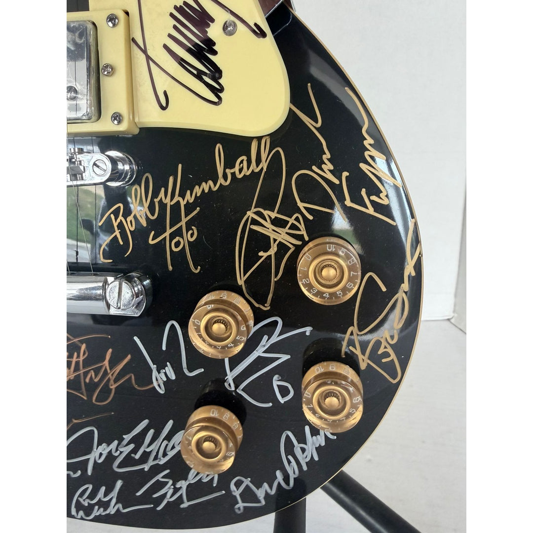 Foreigner Boston, Toto, Steely Dan, Kansas, Styx, Boz Scaggs, Steve Miller black Les Paul electric guitar signed with proof.