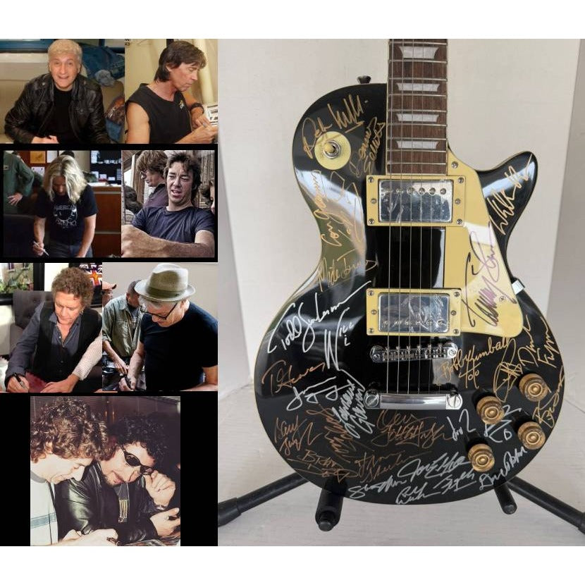 Foreigner Boston, Toto, Steely Dan, Kansas, Styx, Boz Scaggs, Steve Miller black Les Paul electric guitar signed with proof.