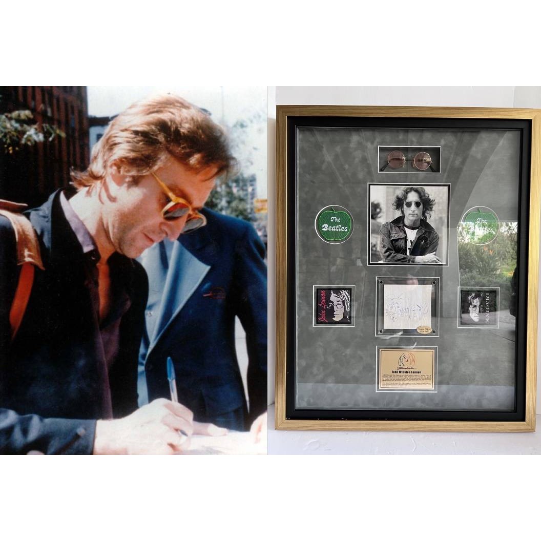 John Lennon The Beatles Co-Vocalist , Song Writer, and lead rhythm guitarist autograph book page signed with sketch & framed with proof