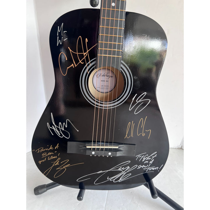 Ziggy, Julian, Stephen, Damian, Ky-Mani Marley acoustic guitar signed with proof