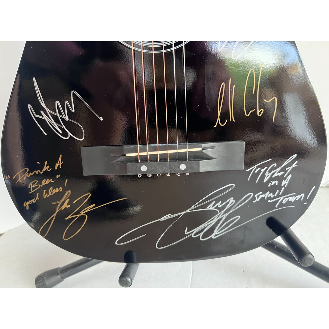 Ziggy, Julian, Stephen, Damian, Ky-Mani Marley acoustic guitar signed with proof