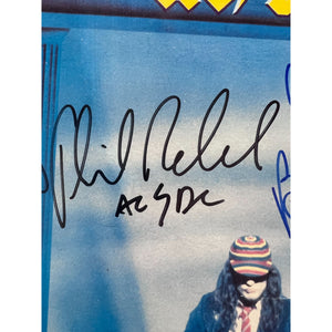 Angus & Malcolm Young Brian Johnson Cliff Williams Phil Rudd AC DC Who made who lp signed with proof