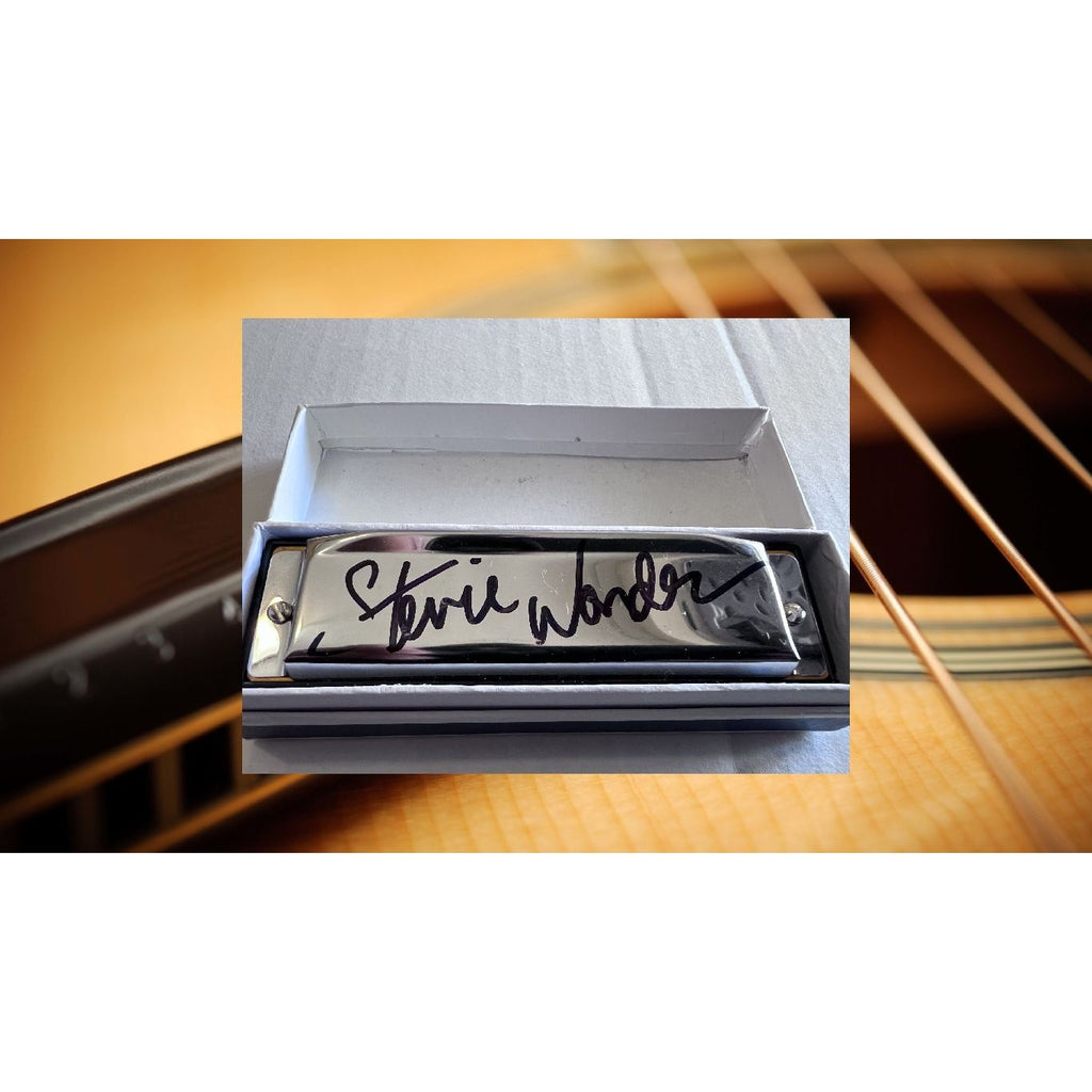 Stevie Wonder harmonica signed with proof