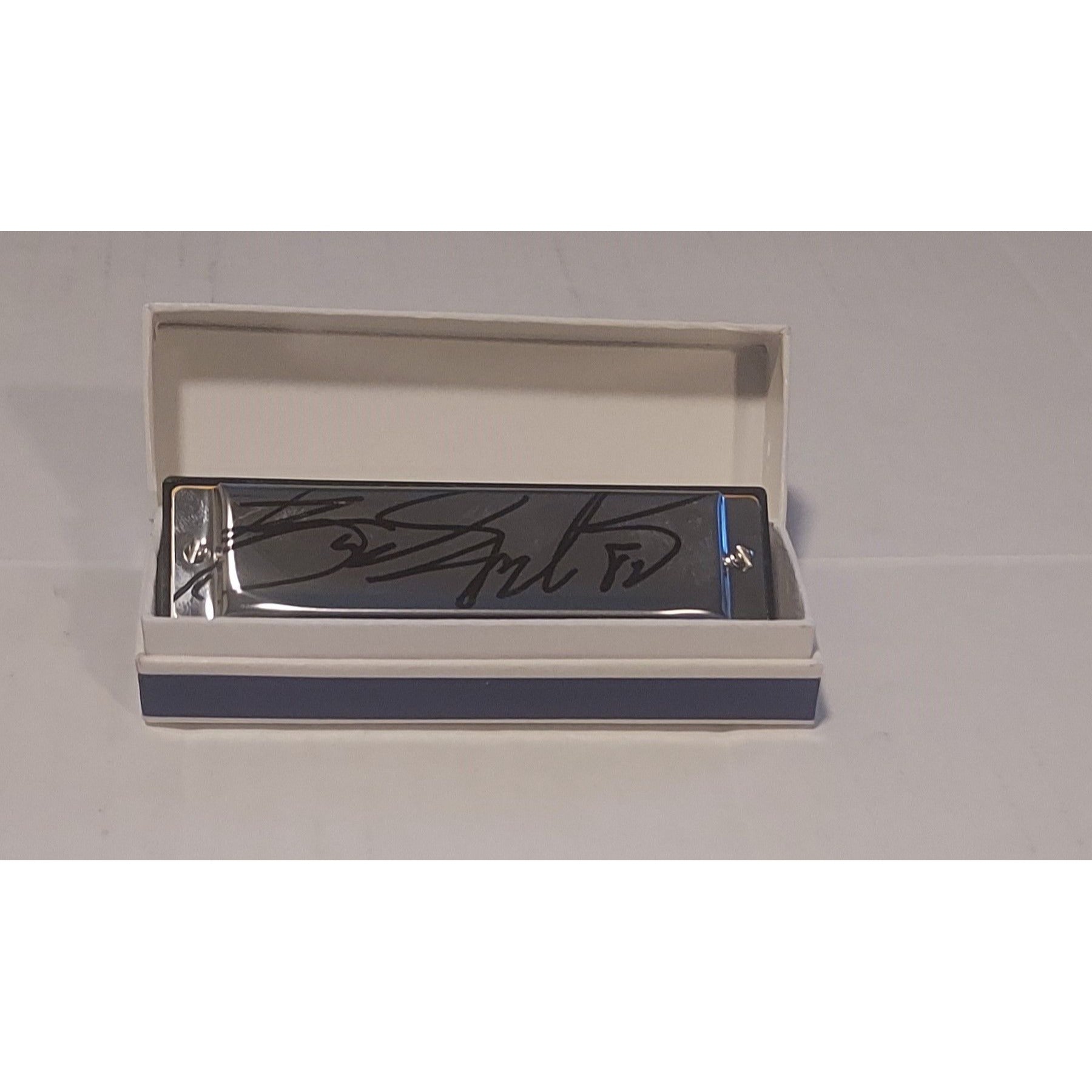 Bruce Springsteen harmonica signed with proof