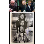 Load image into Gallery viewer, Barry, Robin and Maurice Gibb the Bee Gees 5x7 photo signed with proof
