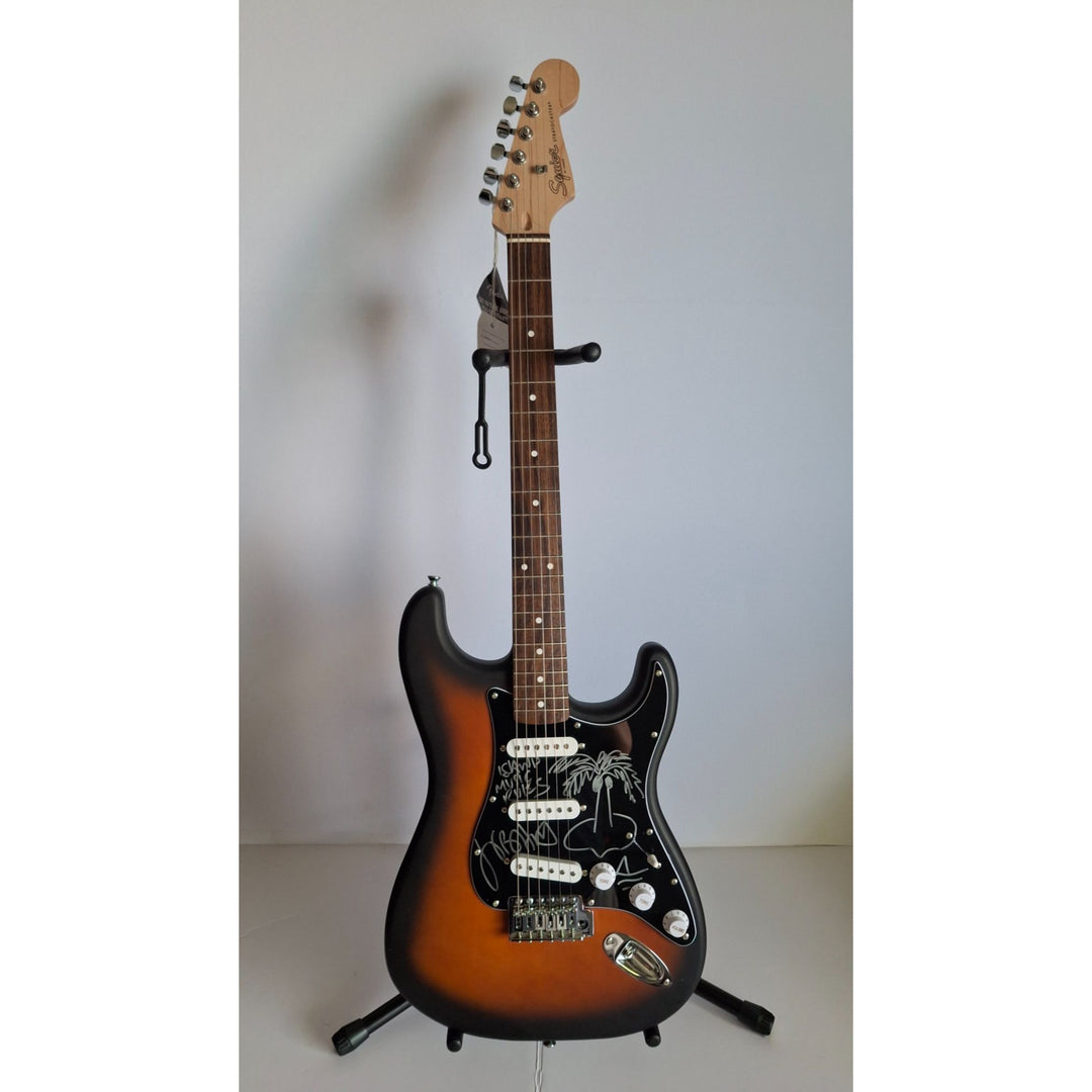 Fender Stratocaster full size electric guitar, Jimmy Buffett signed with proof