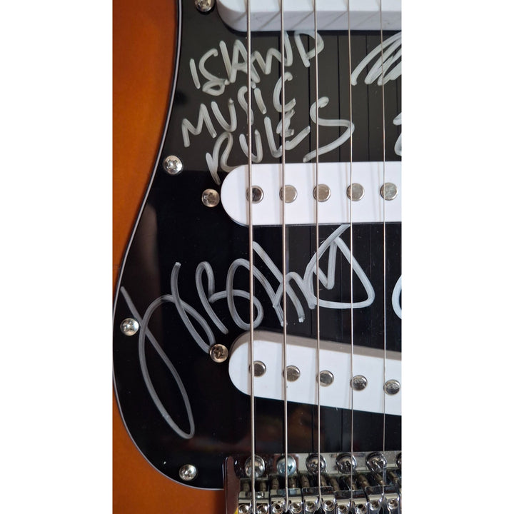 Fender Stratocaster full size electric guitar, Jimmy Buffett signed with proof