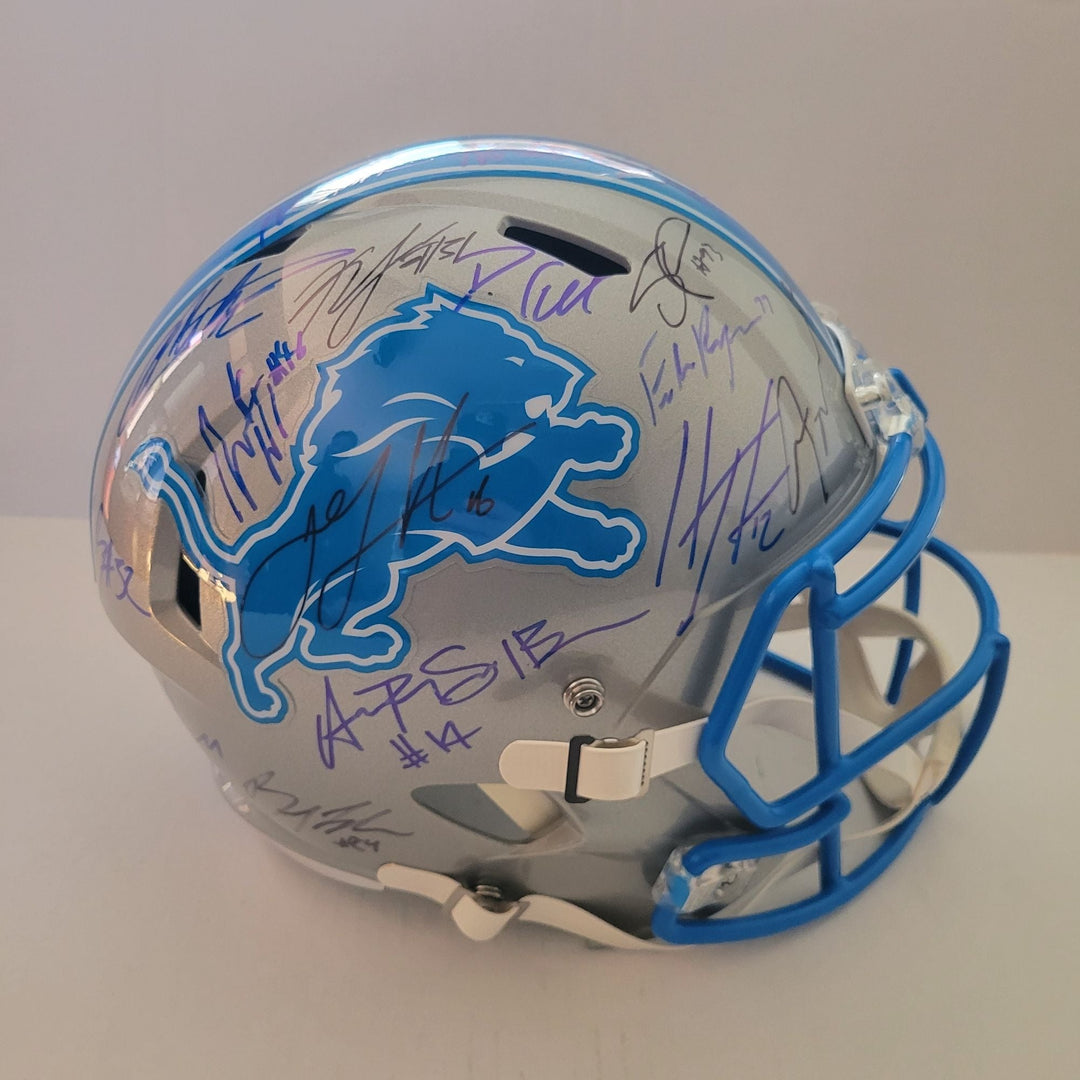 Detroit Lions Riddell authentic pro game model helmet signed by 40 members of the 2024 team with signing proof Awesome Artifacts