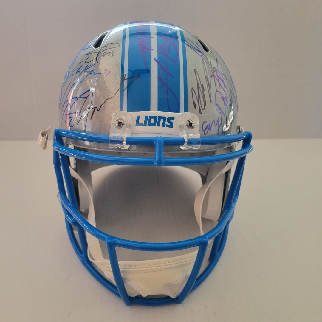 Detroit Lions Riddell authentic pro game model helmet signed by 40 members of the 2024 team with signing proof Awesome Artifacts