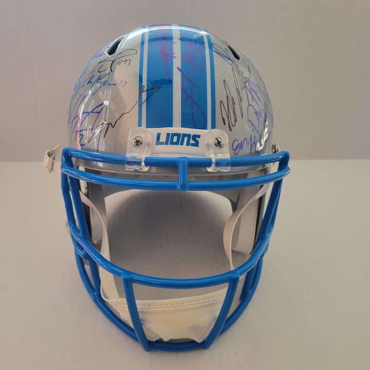 Detroit Lions Riddell authentic pro game model helmet signed by 40 members of the 2024 team with signing proof Awesome Artifacts