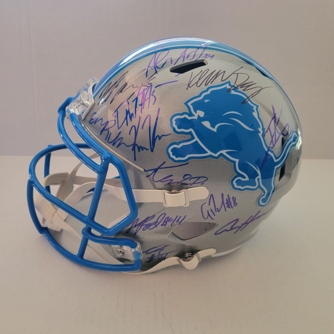 Detroit Lions Riddell authentic pro game model helmet signed by 40 members of the 2024 team with signing proof Awesome Artifacts