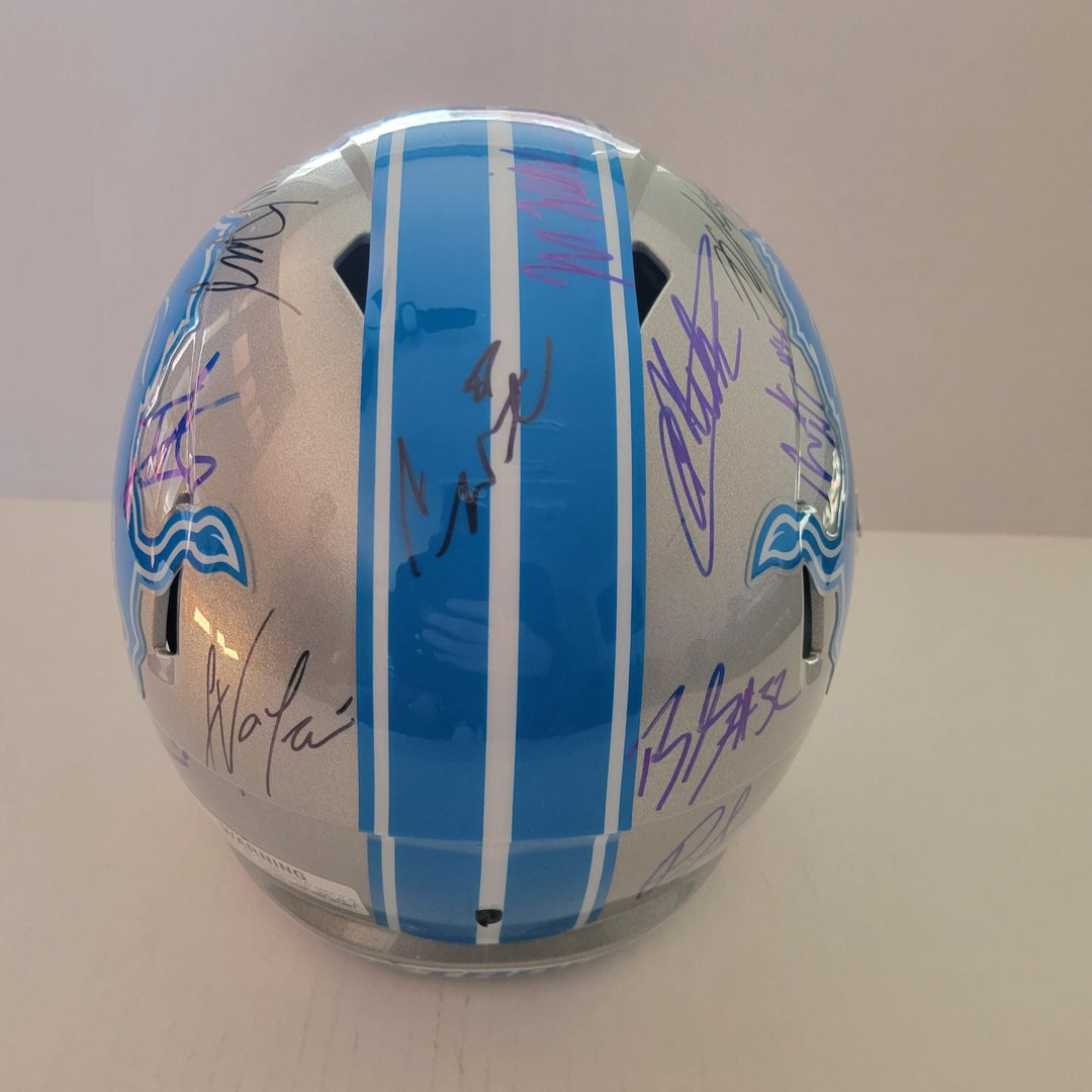 Detroit Lions Riddell authentic pro game model helmet signed by 40 members of the 2024 team with signing proof Awesome Artifacts