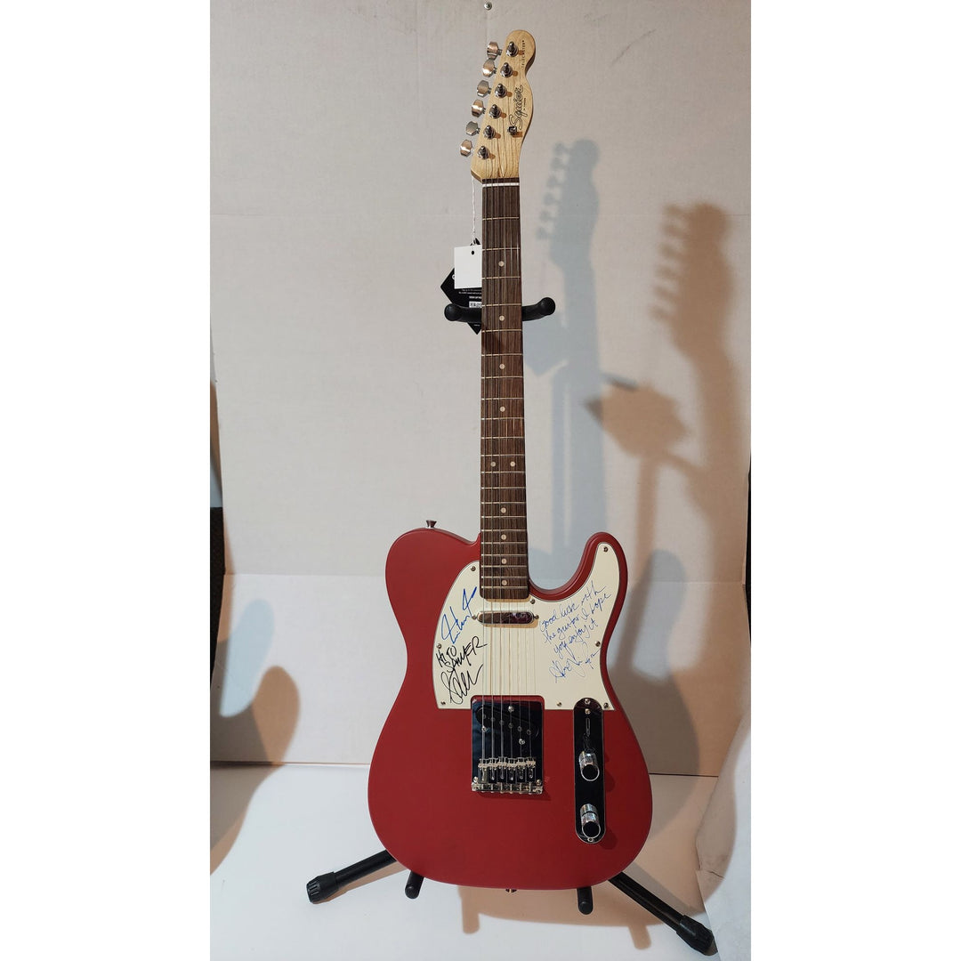 Rush Neil Peart,  Alex Lifeson (inscription), Geddy Lee  original Fender telecaster full size electric guitar signed with proof