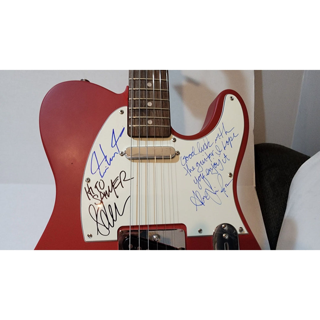 Rush Neil Peart,  Alex Lifeson (inscription), Geddy Lee  original Fender telecaster full size electric guitar signed with proof