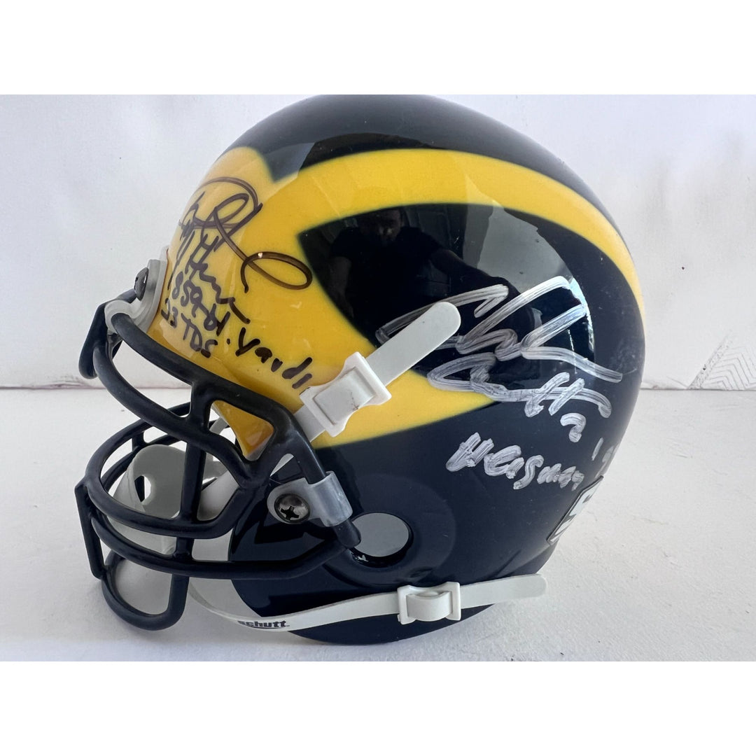 University of Michigan Heisman Trophy award winners Charles Woodson and Desmond Howard Riddell mini helmet signed with proof