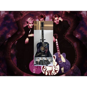 Duran Duran, Simon Le Bon, John, Roger & Andy Taylor, Nick Rhodes One of A kind 39' inch full size acoustic guitar signed with proof