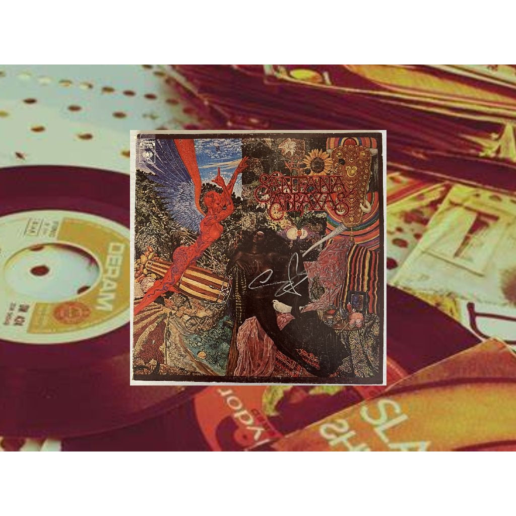 Carlos Santana original LP signed with proof