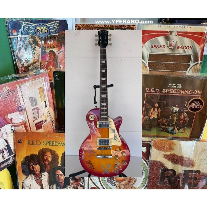 Reo Speedwagon Kevin Cronin, Dave Amato, Bruce Hall, Brian Hitt and Derek Hilland full size les paul electric guitar signed with proof.