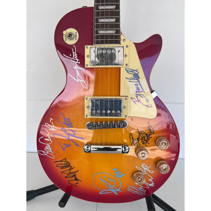 Reo Speedwagon Kevin Cronin, Dave Amato, Bruce Hall, Brian Hitt and Derek Hilland full size les paul electric guitar signed with proof.