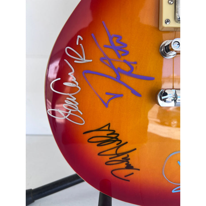 Reo Speedwagon Kevin Cronin, Dave Amato, Bruce Hall, Brian Hitt and Derek Hilland full size les paul electric guitar signed with proof.