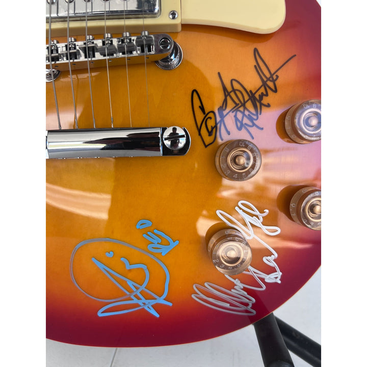 Reo Speedwagon Kevin Cronin, Dave Amato, Bruce Hall, Brian Hitt and Derek Hilland full size les paul electric guitar signed with proof.