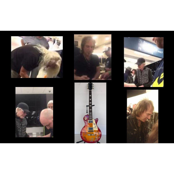 Reo Speedwagon Kevin Cronin, Dave Amato, Bruce Hall, Brian Hitt and Derek Hilland full size les paul electric guitar signed with proof.