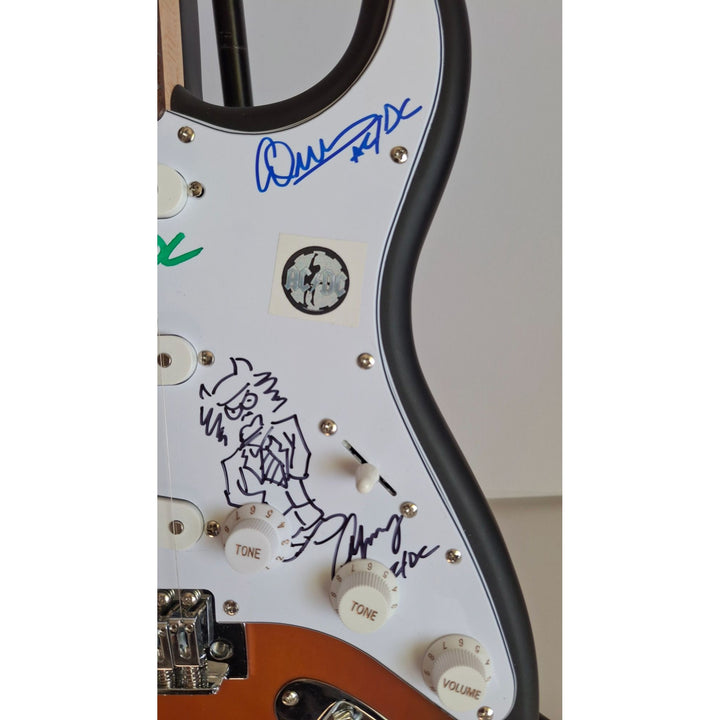 AC/DC Angus & Malcolm Young, Brian Johnston, Phil Rudd, Cliff Williams Fender Stratocaster electric guitar signed with proof