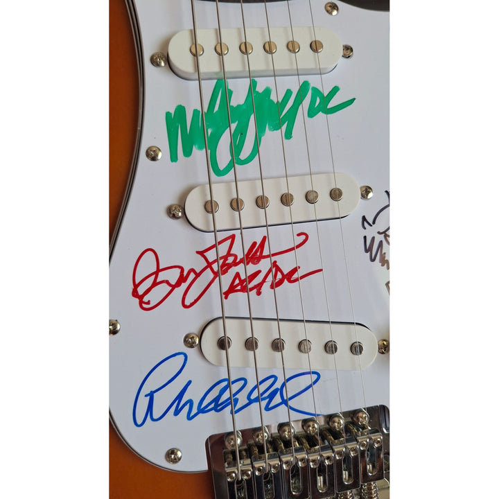 AC/DC Angus & Malcolm Young, Brian Johnston, Phil Rudd, Cliff Williams Fender Stratocaster electric guitar signed with proof