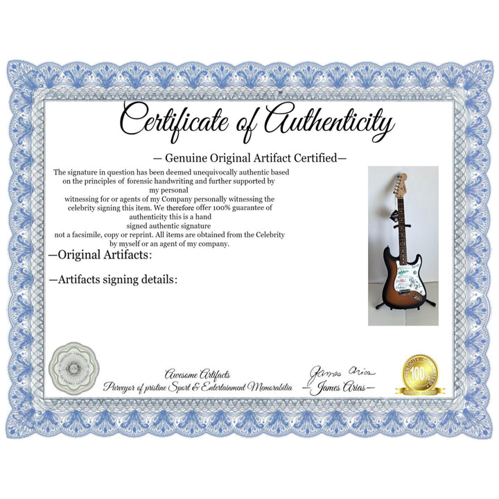 AC/DC Angus & Malcolm Young, Brian Johnston, Phil Rudd, Cliff Williams Fender Stratocaster electric guitar signed with proof