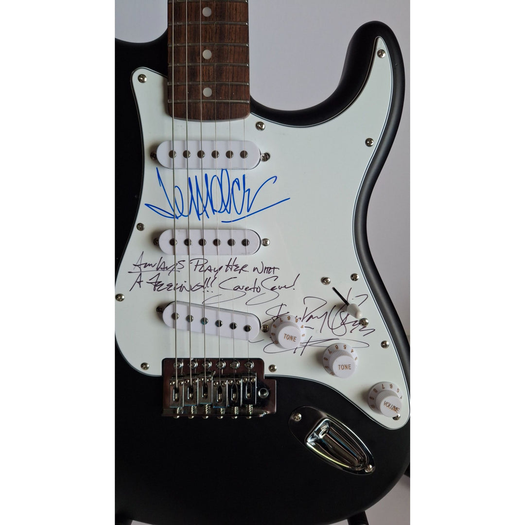 Stevie Ray Vaughan signed "Always Play Her with a Feeling" & Jeff Beck Fender Stratocaster Squier electric guitar signed with proof