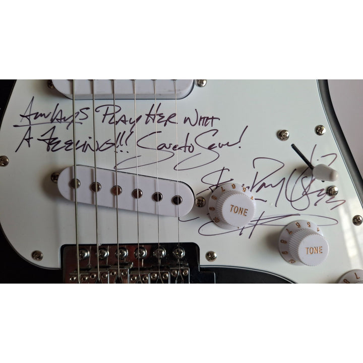 Stevie Ray Vaughan signed "Always Play Her with a Feeling" & Jeff Beck Fender Stratocaster Squier electric guitar signed with proof