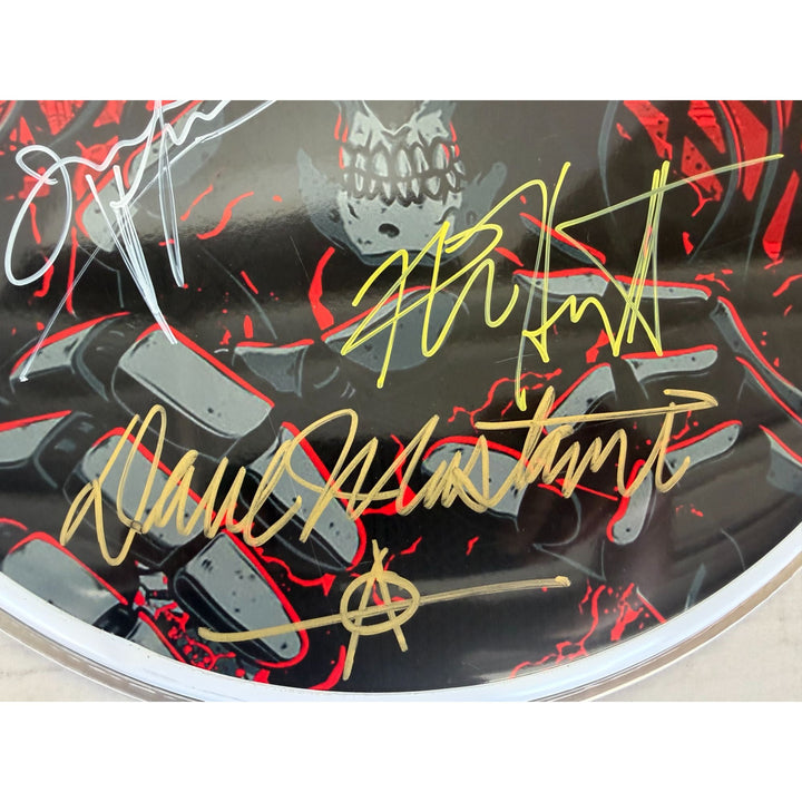 Metallica James Hetfield Lars Ulrich Robert Trujillo Dave Mustaine Jason Newsted drumhead signed with proof.