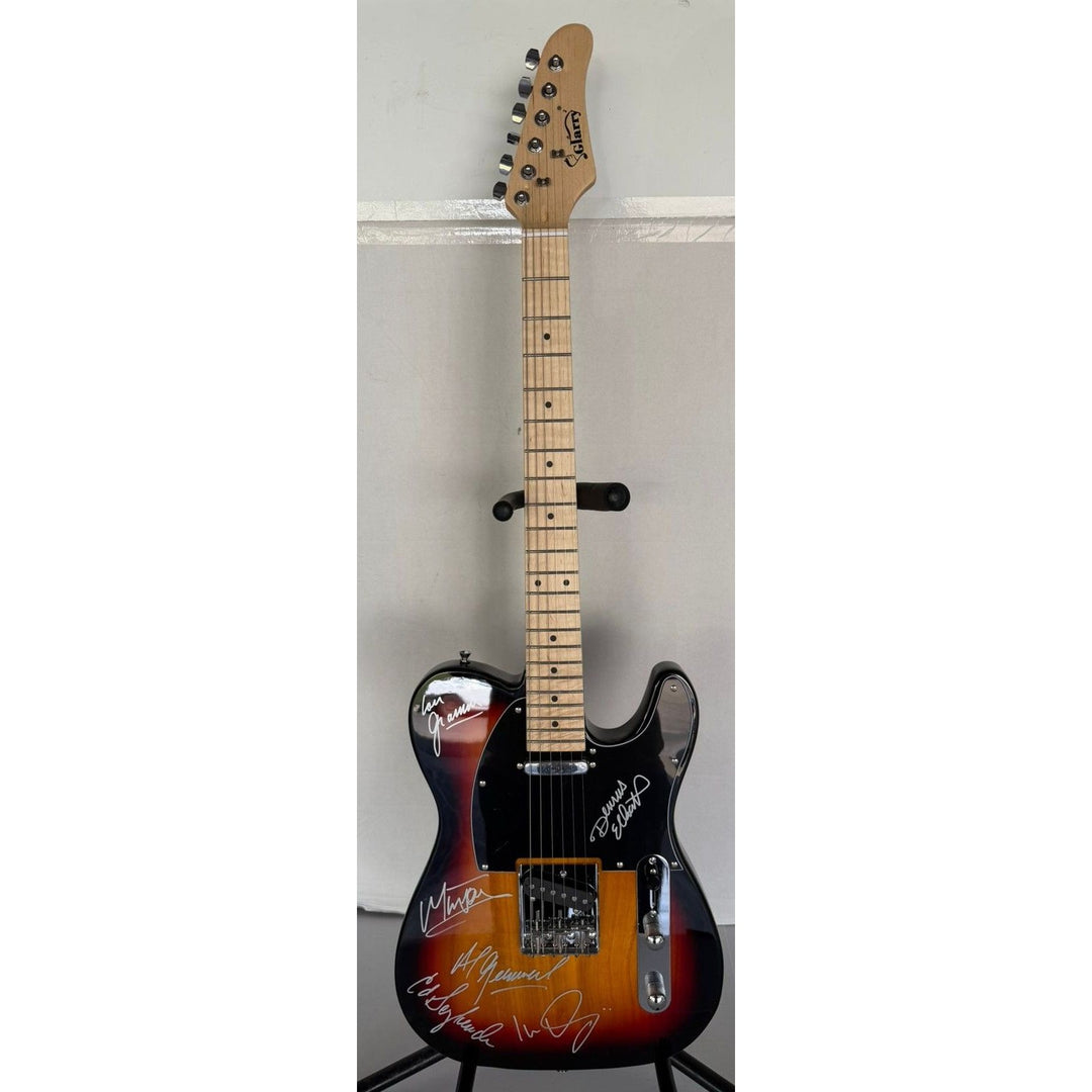 Foreigner telecaster electric guitar signed by Mick Jones, Dennis Elliott, Al Greenwood, Lou Gramm, Ian McDonald and Ed Gagliardi.