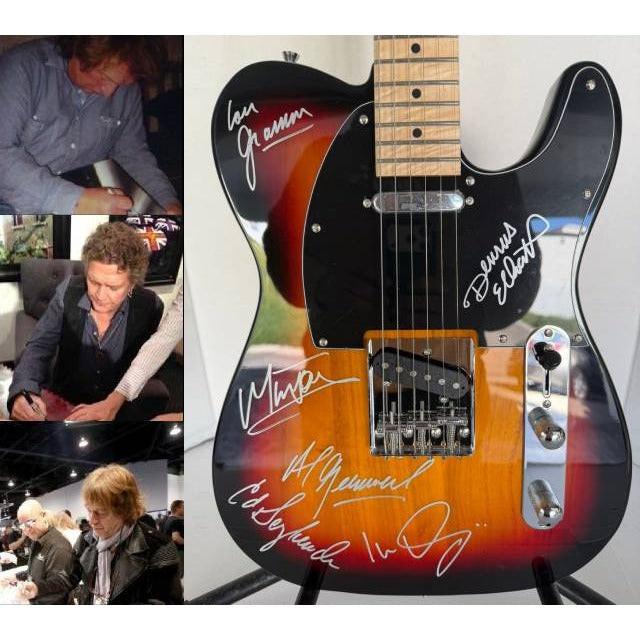 Foreigner telecaster electric guitar signed by Mick Jones, Dennis Elliott, Al Greenwood, Lou Gramm, Ian McDonald and Ed Gagliardi.