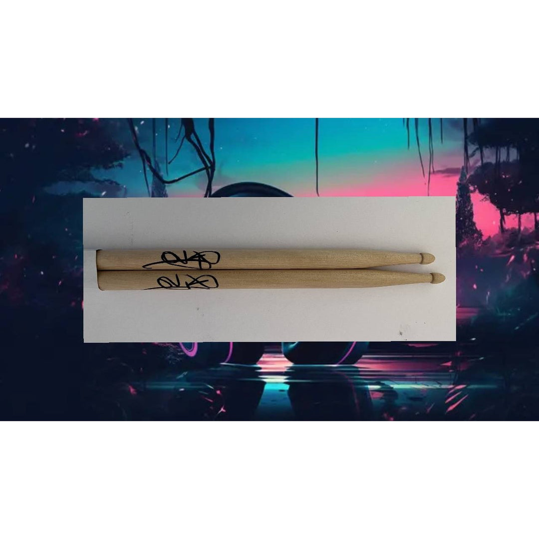 Bill Ward of Black Sabbath Drumsticks signed with proof.