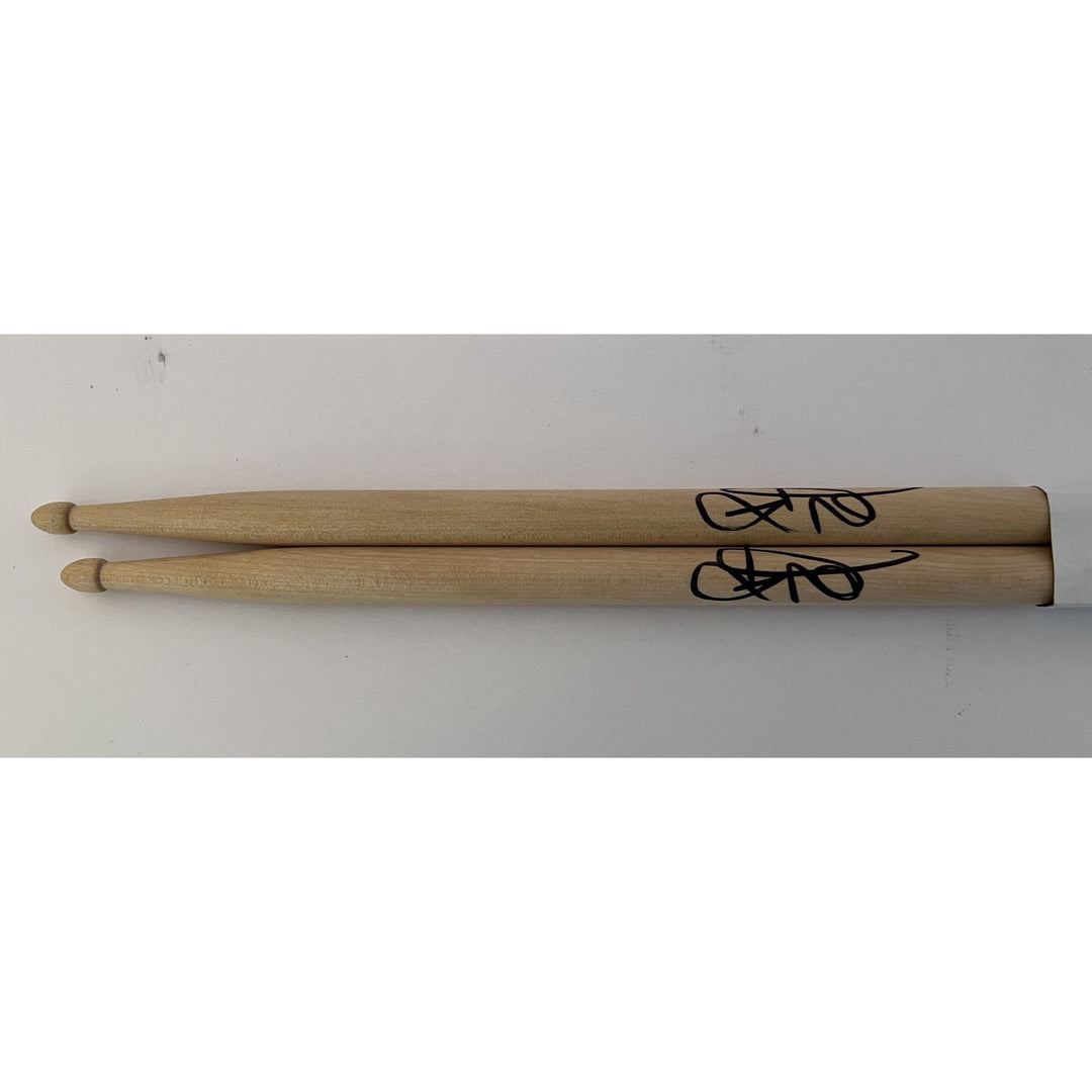 Bill Ward of Black Sabbath Drumsticks signed with proof.