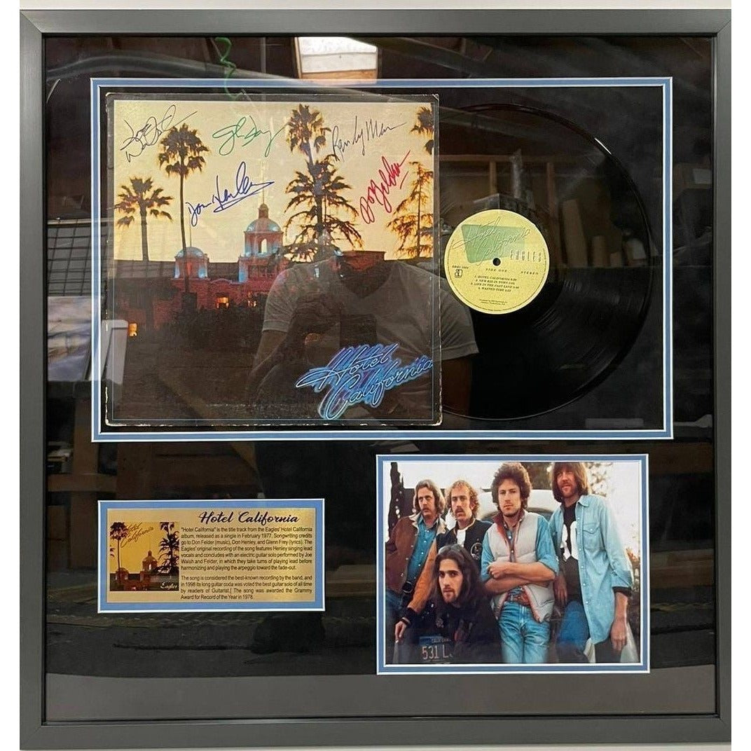 The Eagles Hotel California LP Don Felder Glenn Frey Don Felder Don Henley Randy Meisner Joe Walsh signed & framed 30x38 with proof.