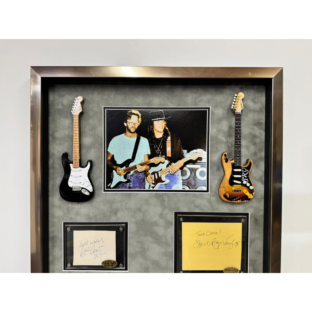 Stevie Ray Vaughan vintage Eric Clapton signed with proof and Museum quality frame Awesome Artifacts