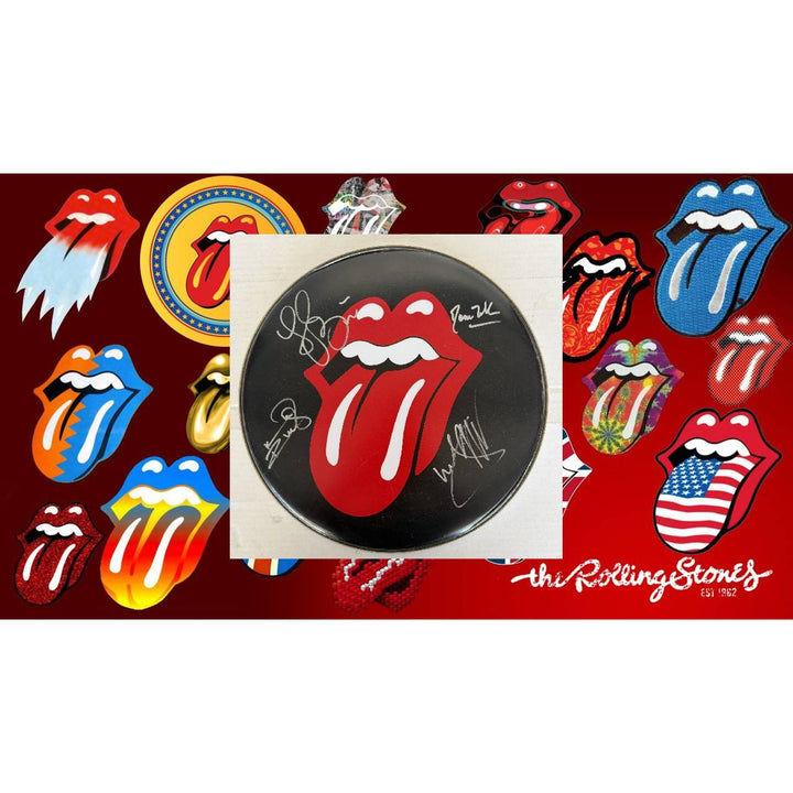 Keith Richards, Charlie Watts, Ronnie Wood, Mick Jagger, The Rolling Stones one-of-a-kind drumhead signed with proof.