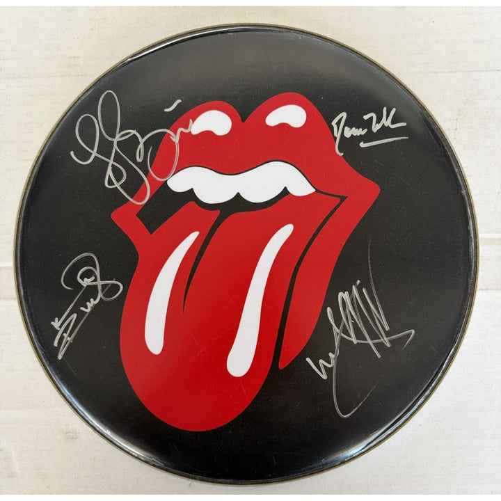 Keith Richards, Charlie Watts, Ronnie Wood, Mick Jagger, The Rolling Stones one-of-a-kind drumhead signed with proof.