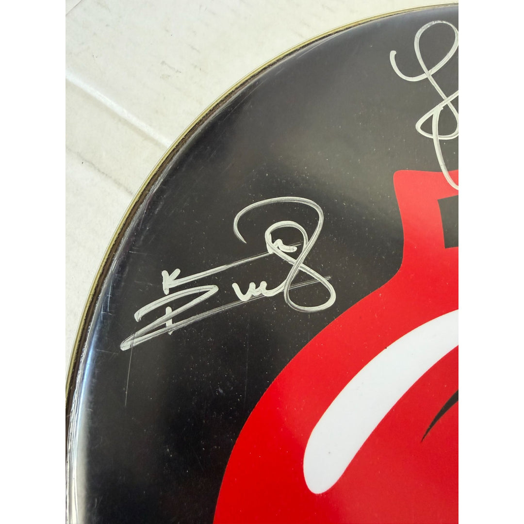 Keith Richards, Charlie Watts, Ronnie Wood, Mick Jagger, The Rolling Stones one-of-a-kind drumhead signed with proof.