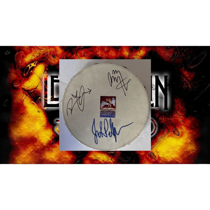 Led Zeppelin Jimmy Page, Robert Plant, John Paul Jones, 14-inch tambourine signed with proof